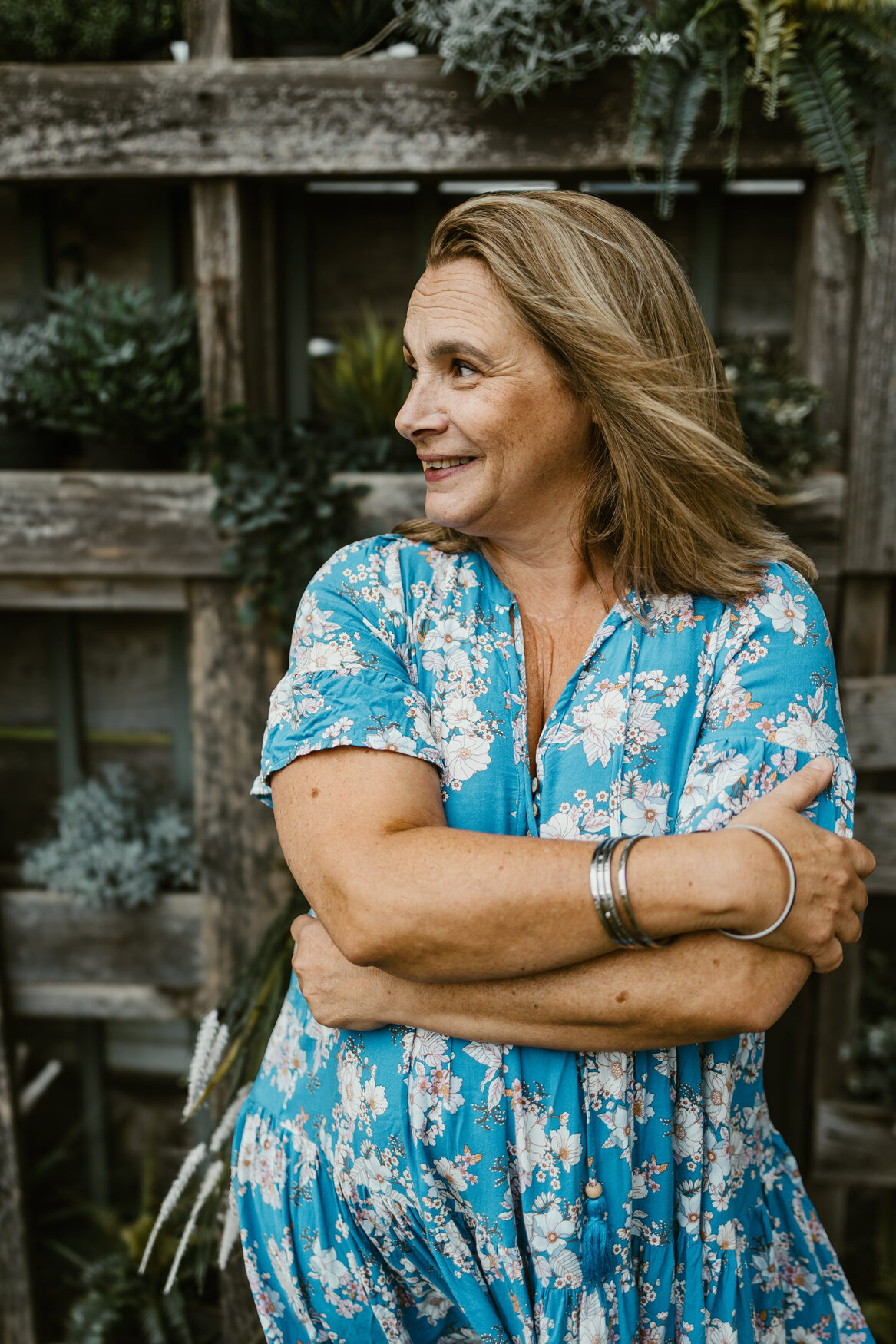 Nikki Filia, owner of BE. Bangles, photographed in her garden.